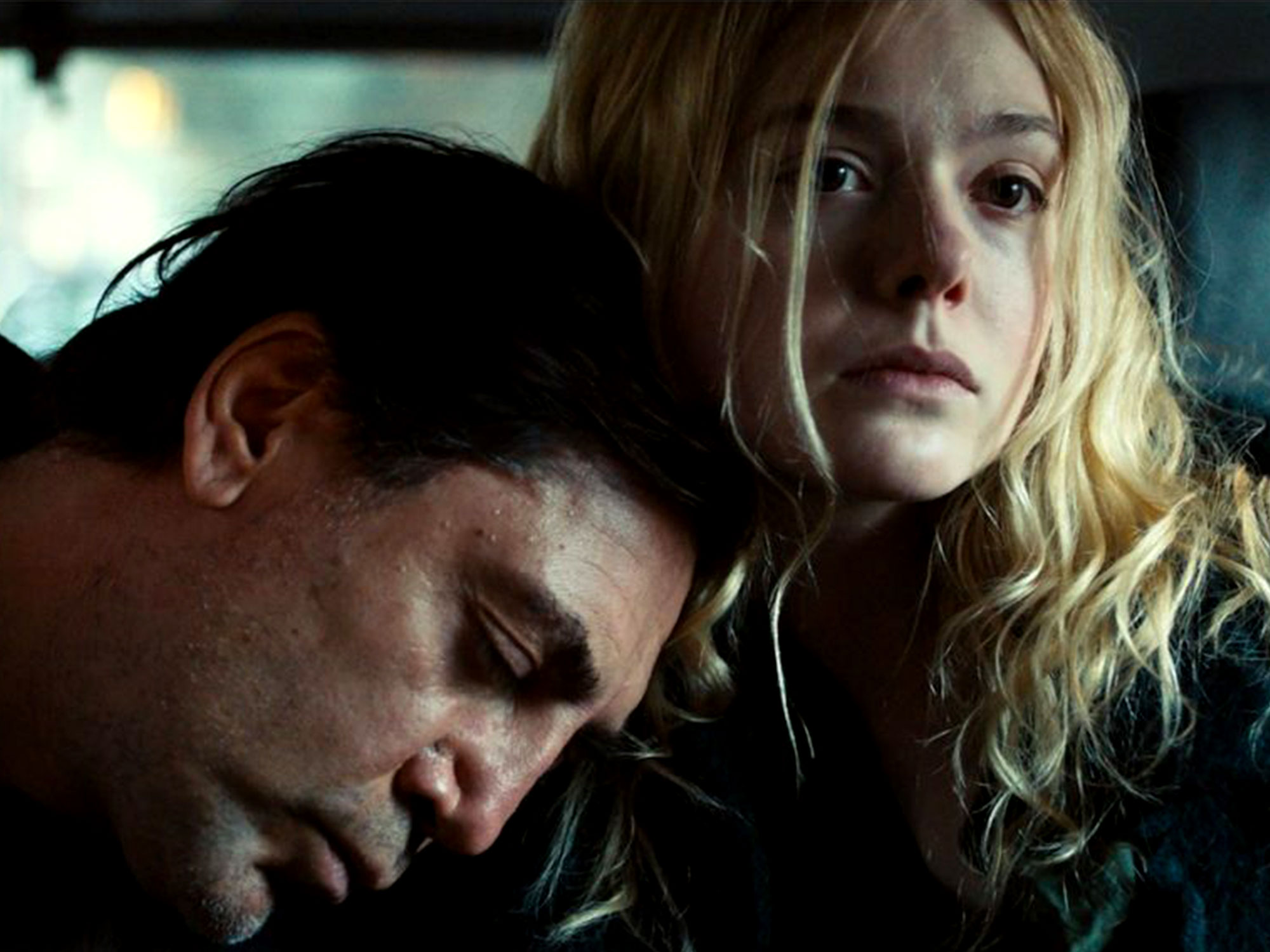 Elle Fanning and Javer Bardem in The Roads Not Taken (2020)